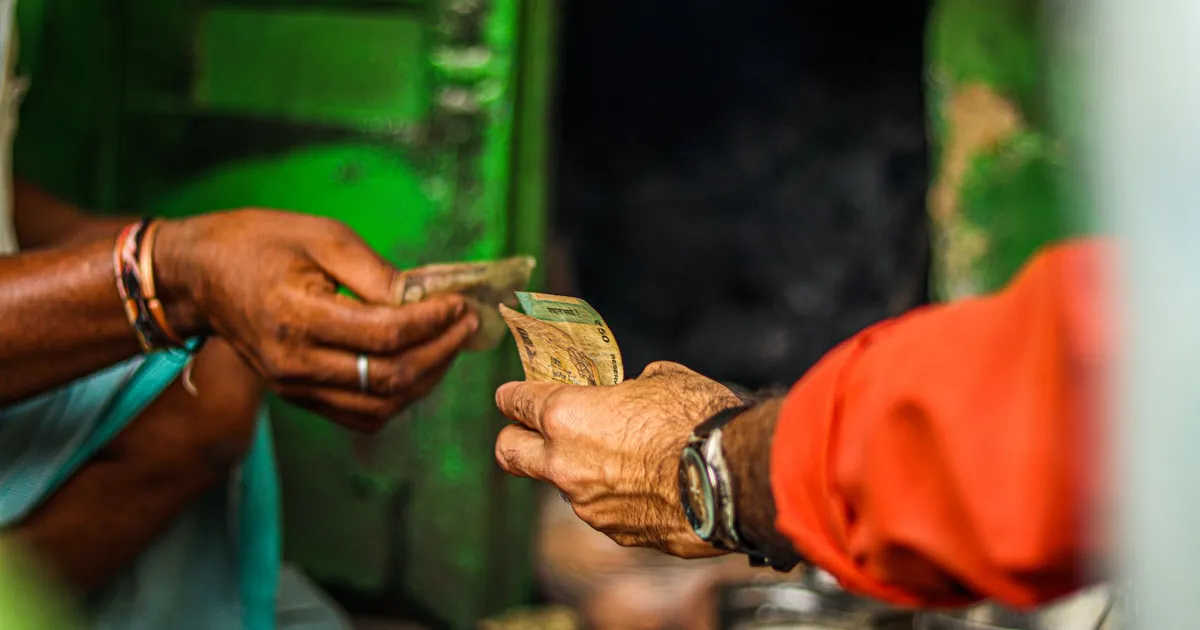 Money and Connectivity in Cambodia: Dollars, Riel, ATMs and SIMs