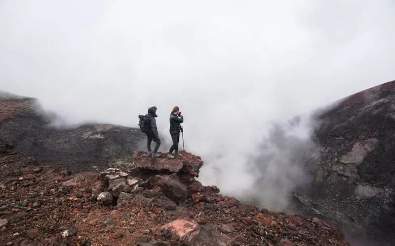 hikers headlamps volcano trail night