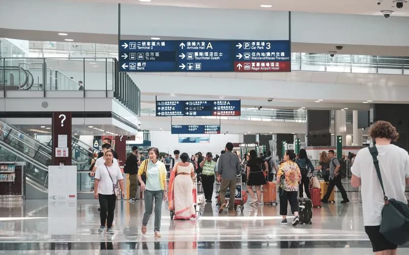 bali airport departure hall travelers