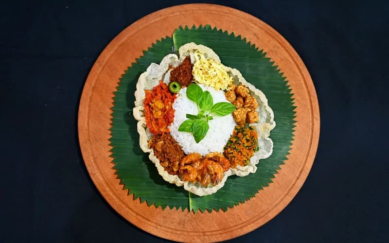 repas feuille de bananier malaisie mains