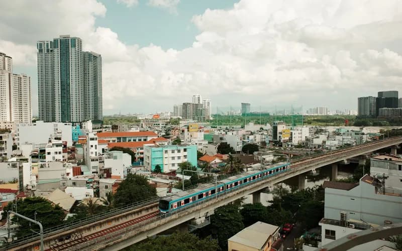 elevated metro viaduct crossing a city highway