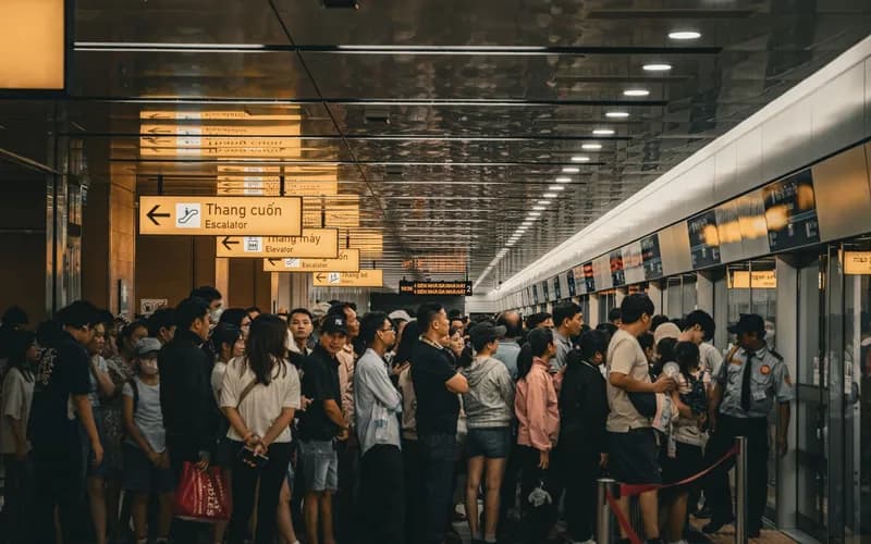 commuters waiting on a clean metro platform in Hanoi